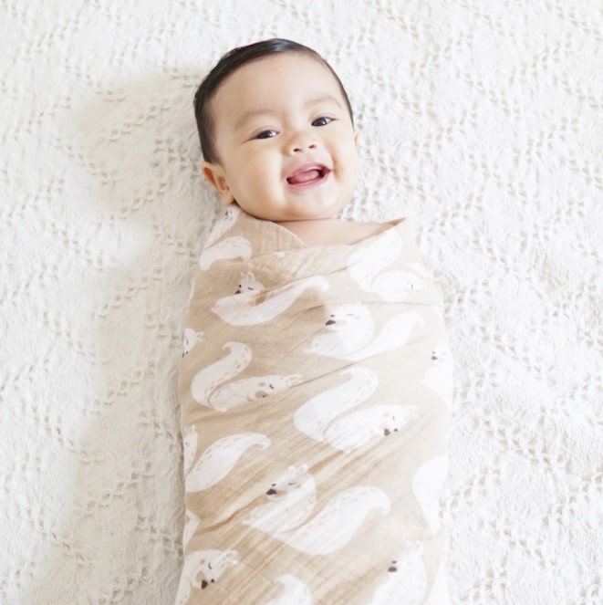 swaddle your baby to help them to sleep