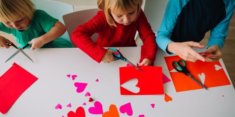 Kids crafting their Valentine's day gift