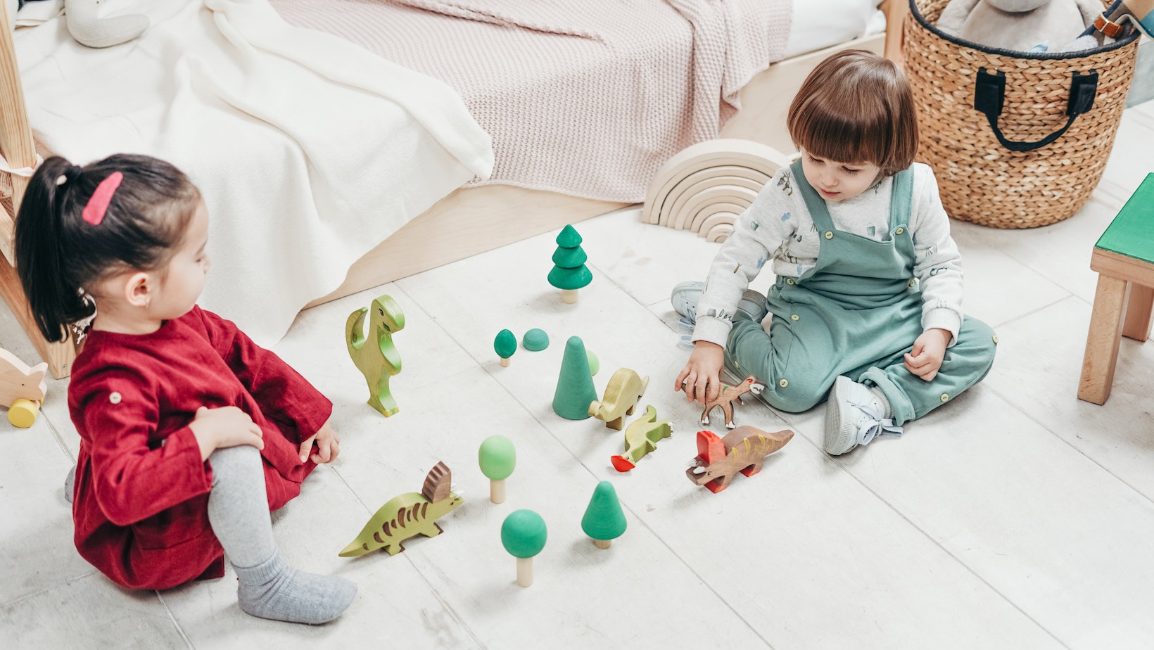 What are the benefits of animal figurines in toddler play?